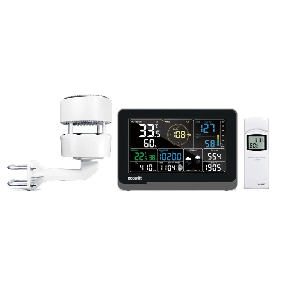 The image shows a weather station set which includes a 7.5" LCD display console, a white sensor array with a solar panel, and a separate white temperature and humidity sensor.